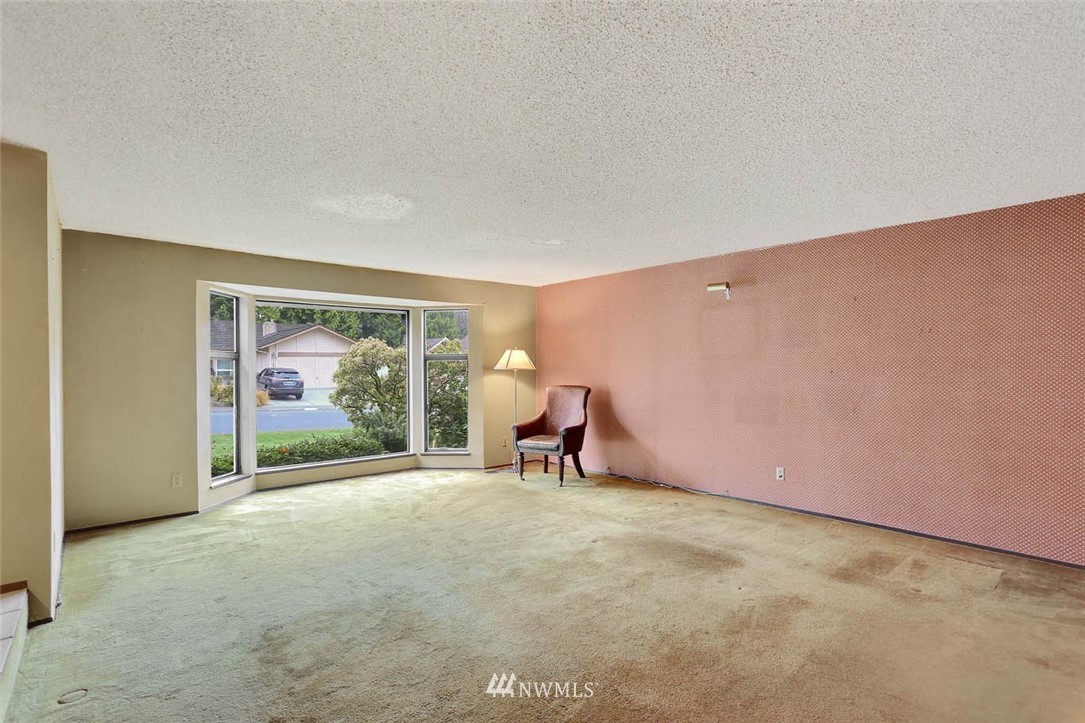 14811 Southeast 172nd Place Renton, WA 98058 - Photo 5 of 24 a view of a room with a large window