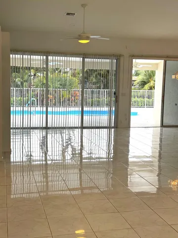 a view of a room with windows