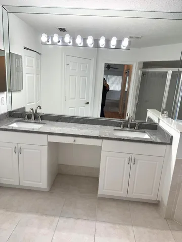 a bathroom with a toilet and a sink