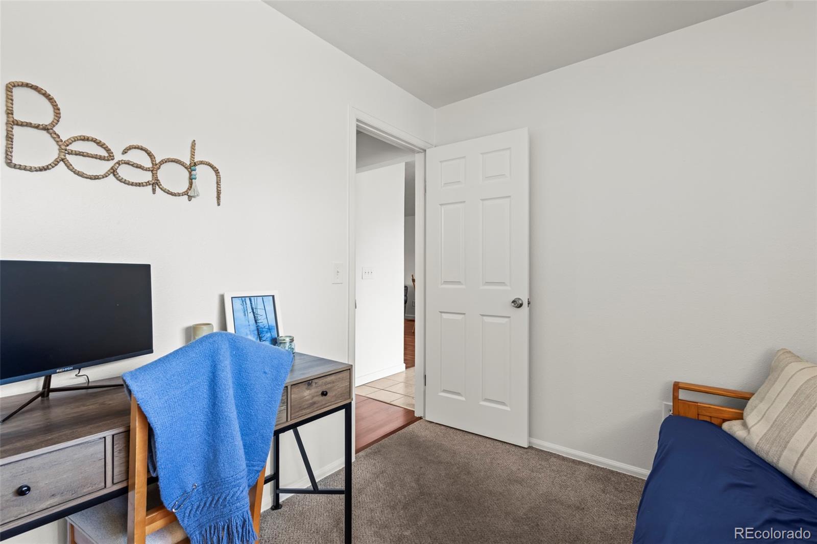 8450 Decatur Street, Unit 98 Westminster, CO 80031 - Photo 19 of 23 a view of a workspace with furniture