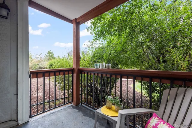 a view of roof deck with furniture