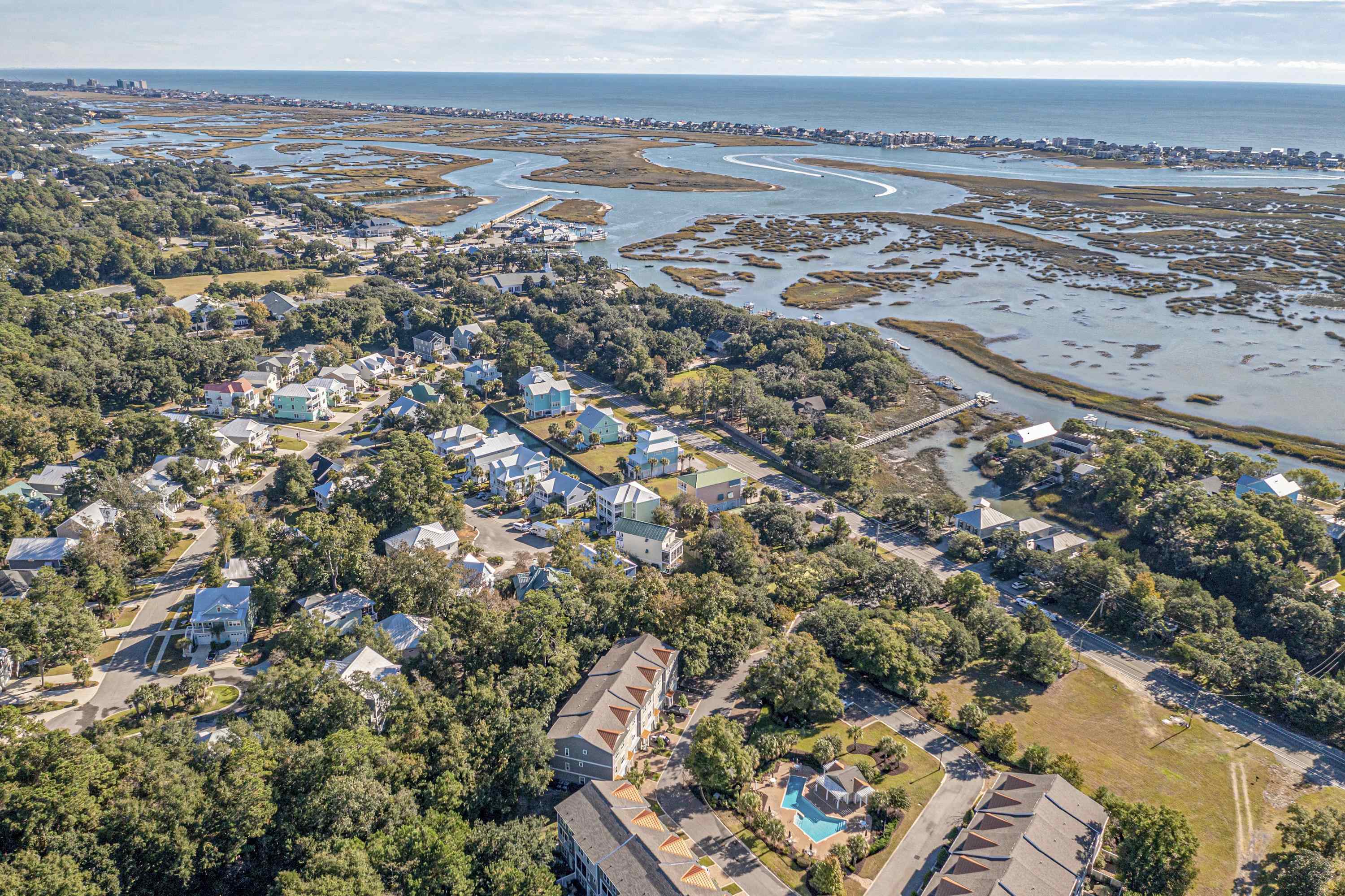 948 Jackline Place, Unit 201 Murrells Inlet, SC 29576 - Photo 34 of 37 Aerial overview of property's location featuring nearby suburban area and a nearby body of water