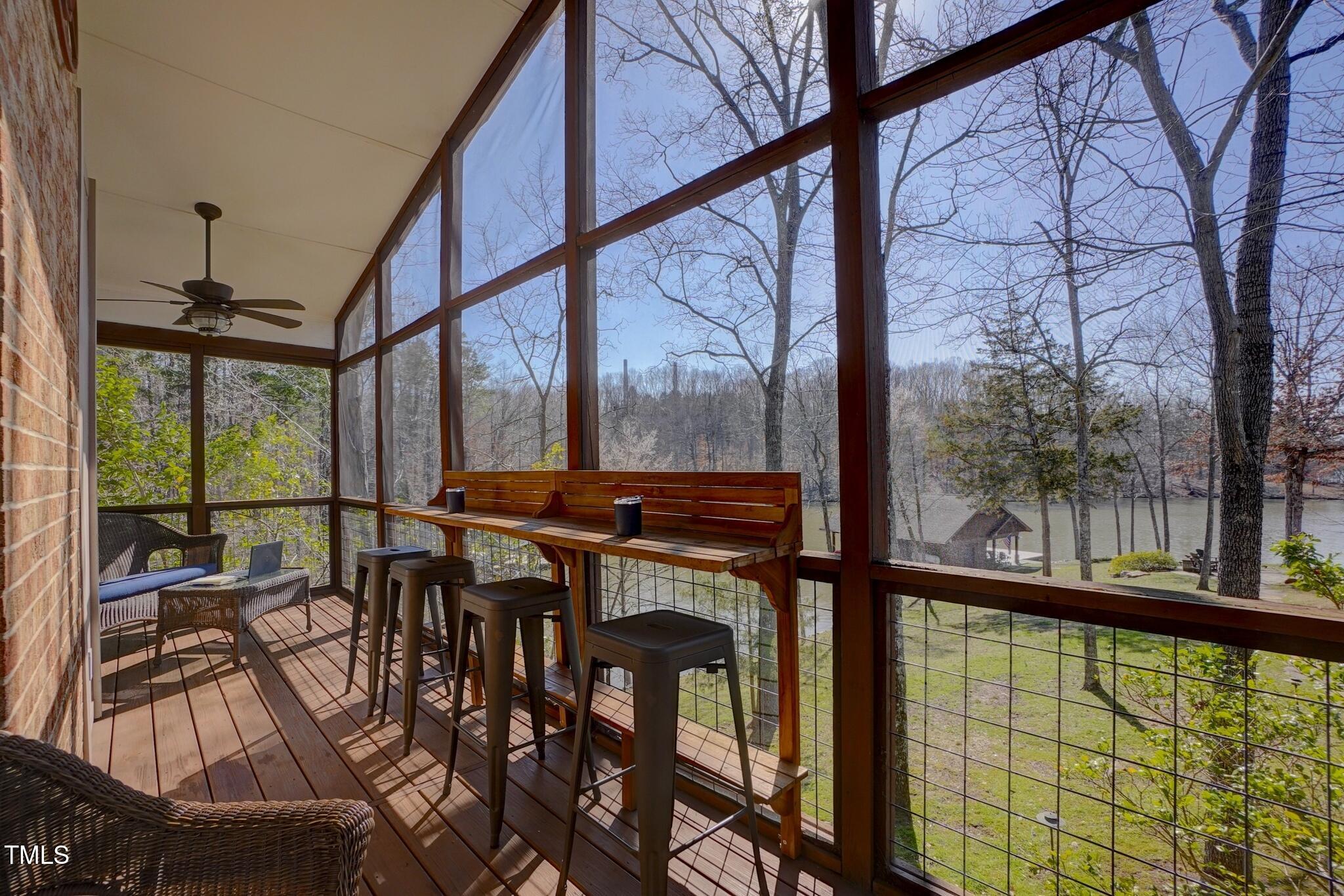 391 Roy Carver Road Semora, NC 27343 - Photo 35 of 40 scr porch and bar