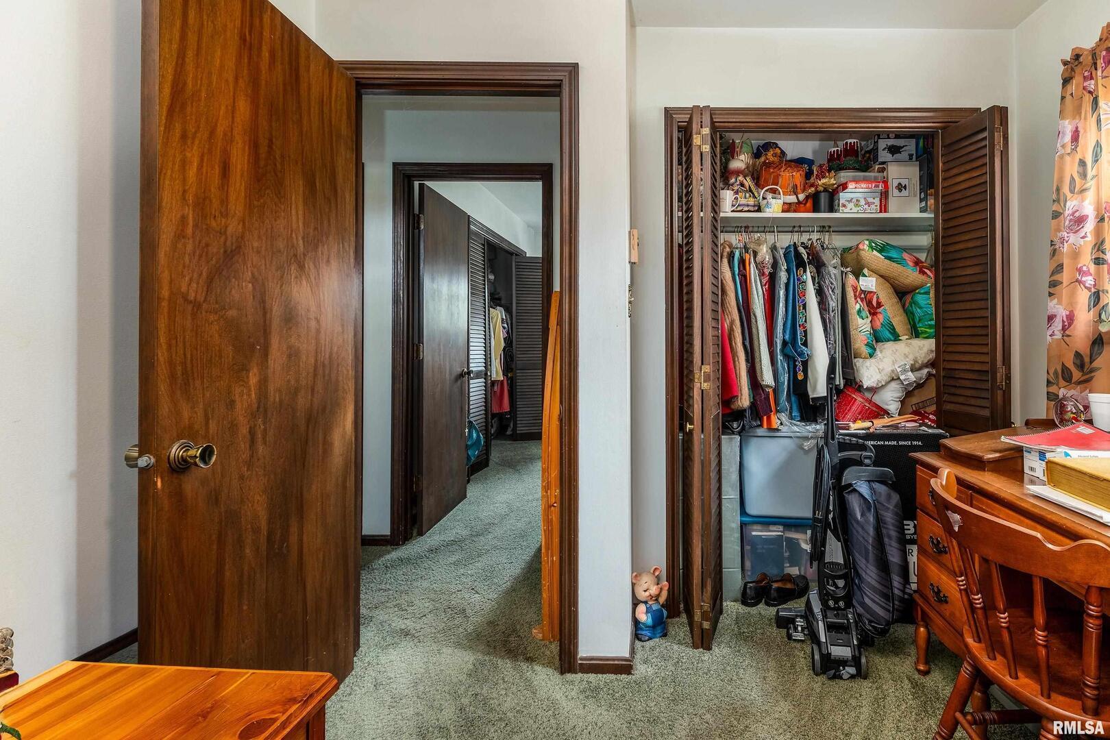 16768 Boundary Road Creal Springs, IL 62922 - Photo 12 of 21 a view of a livingroom with furniture and closet