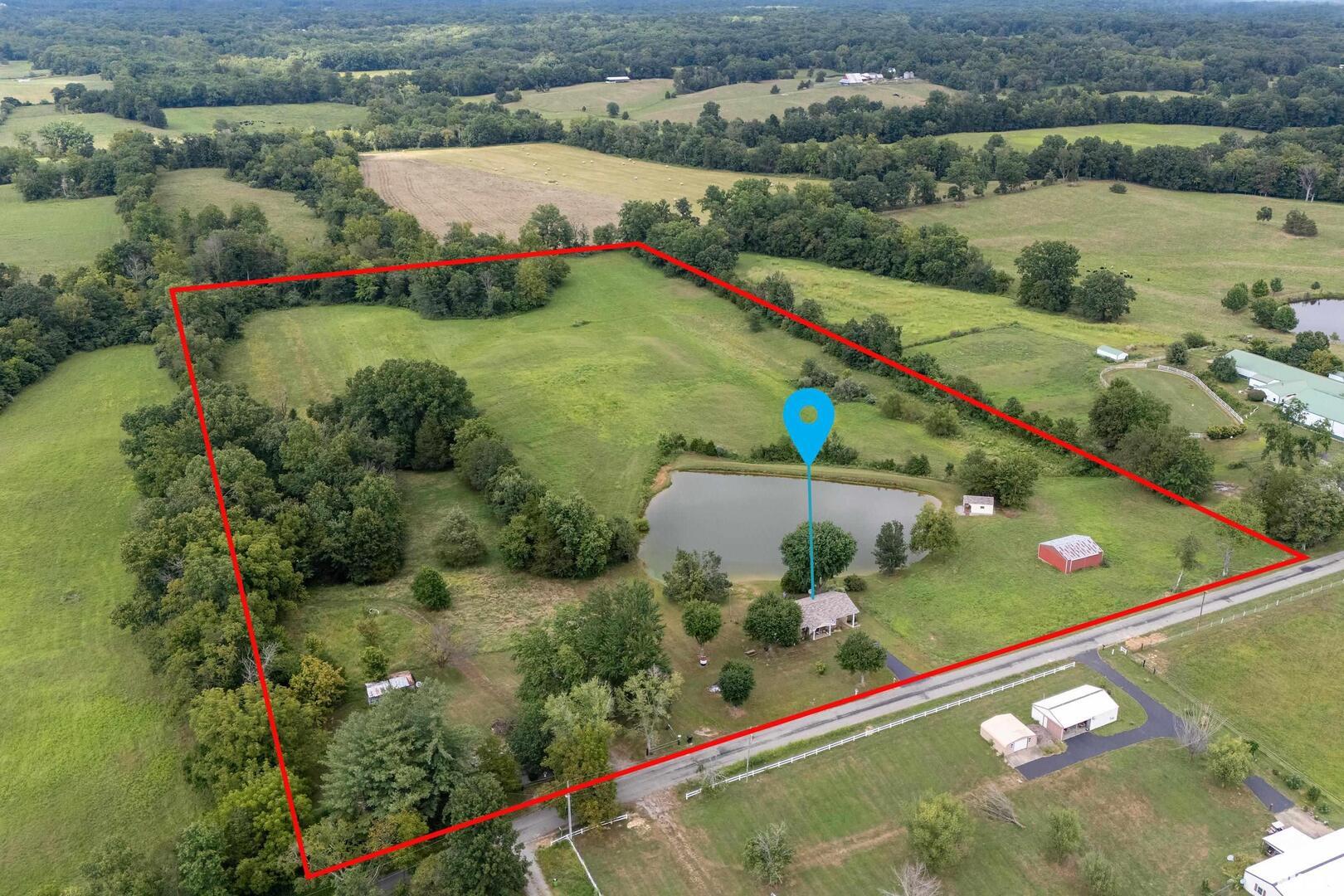 16768 Boundary Road Creal Springs, IL 62922 - Photo 17 of 21 an aerial view of a golf course with a lake view