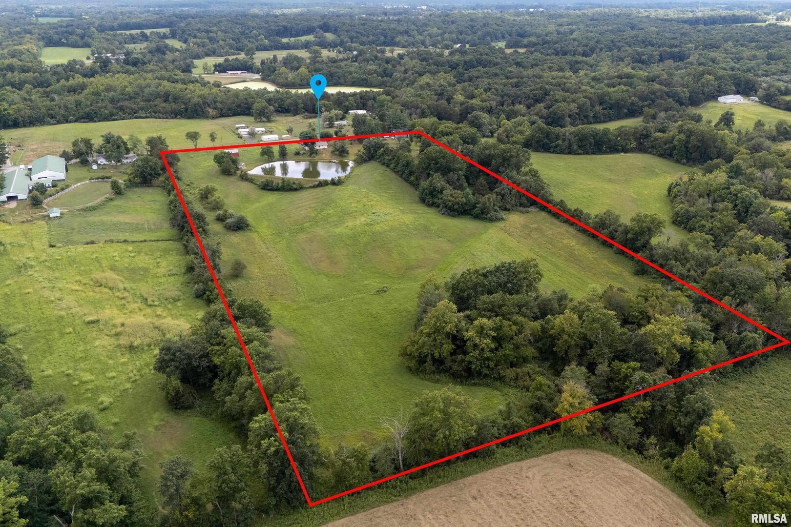 16768 Boundary Road Creal Springs, IL 62922 - Photo 19 of 21 an aerial view of a house with a yard and lake view