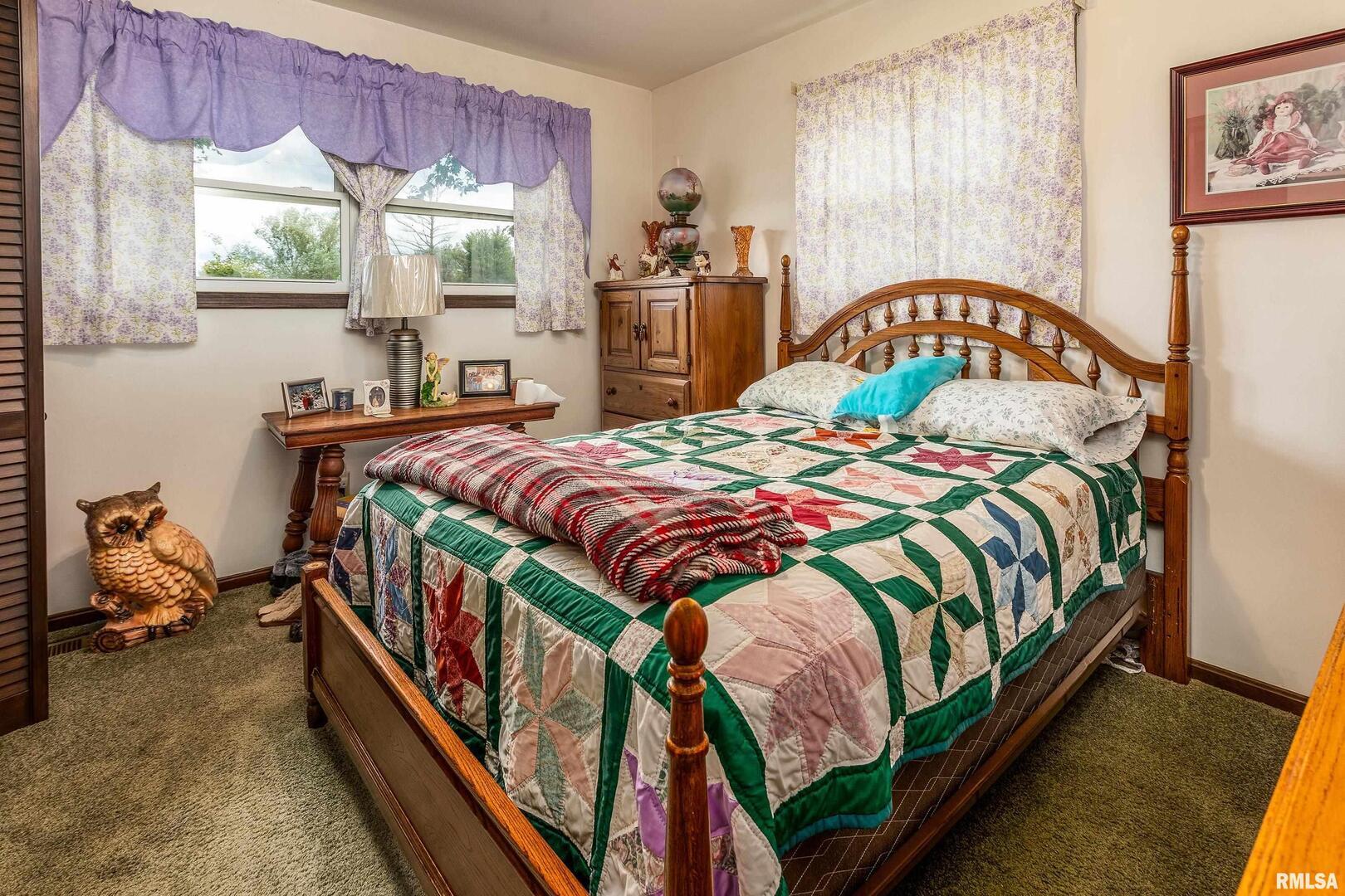 16768 Boundary Road Creal Springs, IL 62922 - Photo 10 of 21 a bedroom with a bed and a window