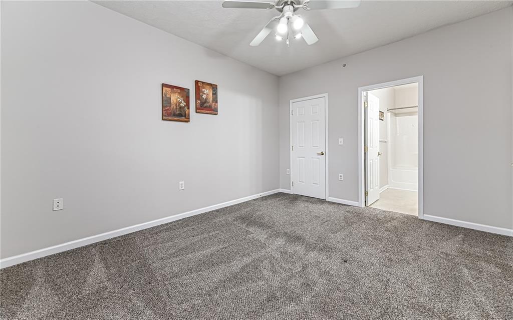 1012 Stockton Ridge Cranberry Township, PA 16066 - Photo 18 of 32 an empty room with a chandelier fan