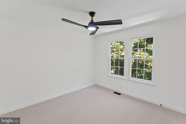 an empty room with window