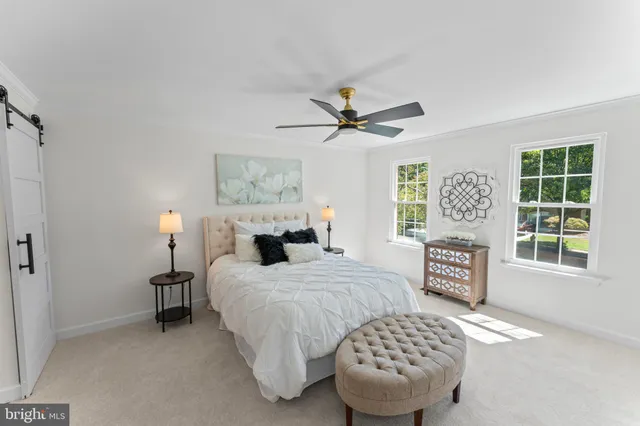 a view of empty room with windows