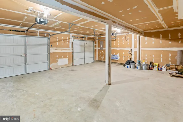 a view of an empty room with windows