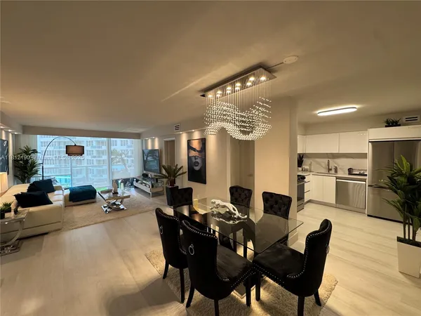a view of a dining room with furniture