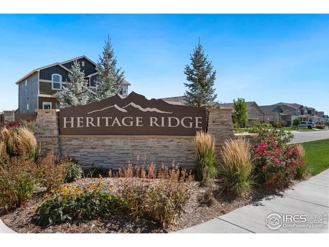 a view of a sign board with yard