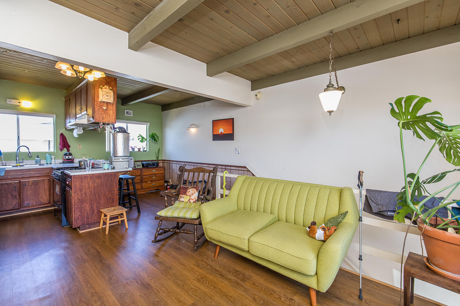 133 Burbank Avenue Oxnard, CA 93035 - Photo 17 of 40 a living room with furniture and a wooden floor