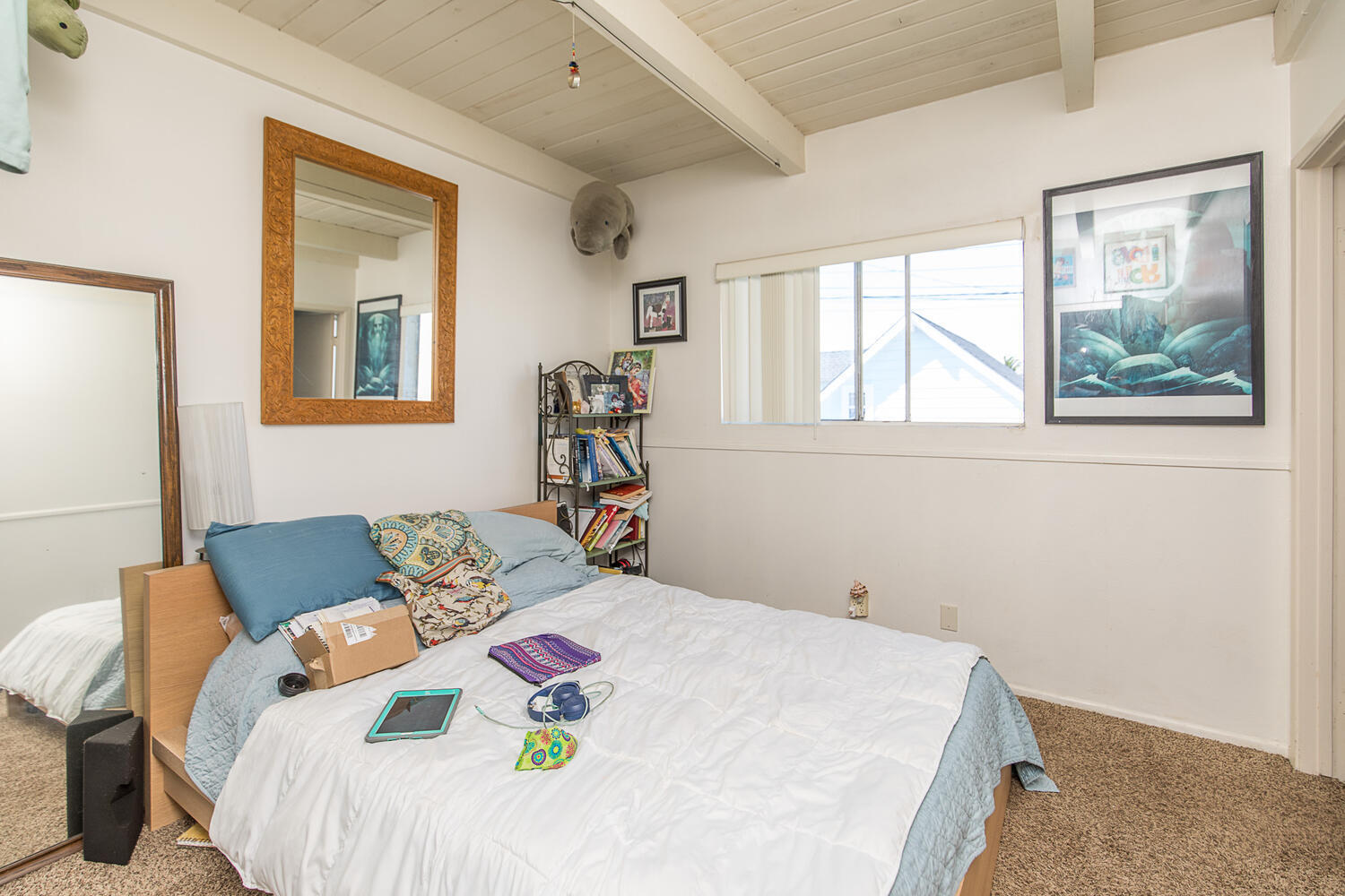 133 Burbank Avenue Oxnard, CA 93035 - Photo 21 of 40 a bed sitting in a bedroom next to a window