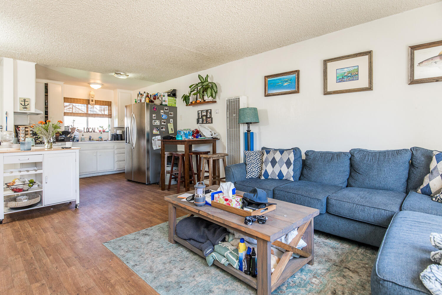 133 Burbank Avenue Oxnard, CA 93035 - Photo 24 of 40 a living room with furniture and wooden floor