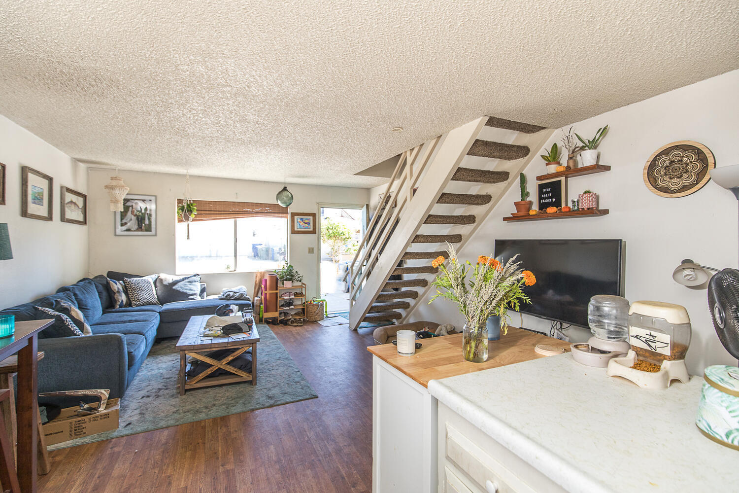 133 Burbank Avenue Oxnard, CA 93035 - Photo 27 of 40 a living room with furniture and wooden floor