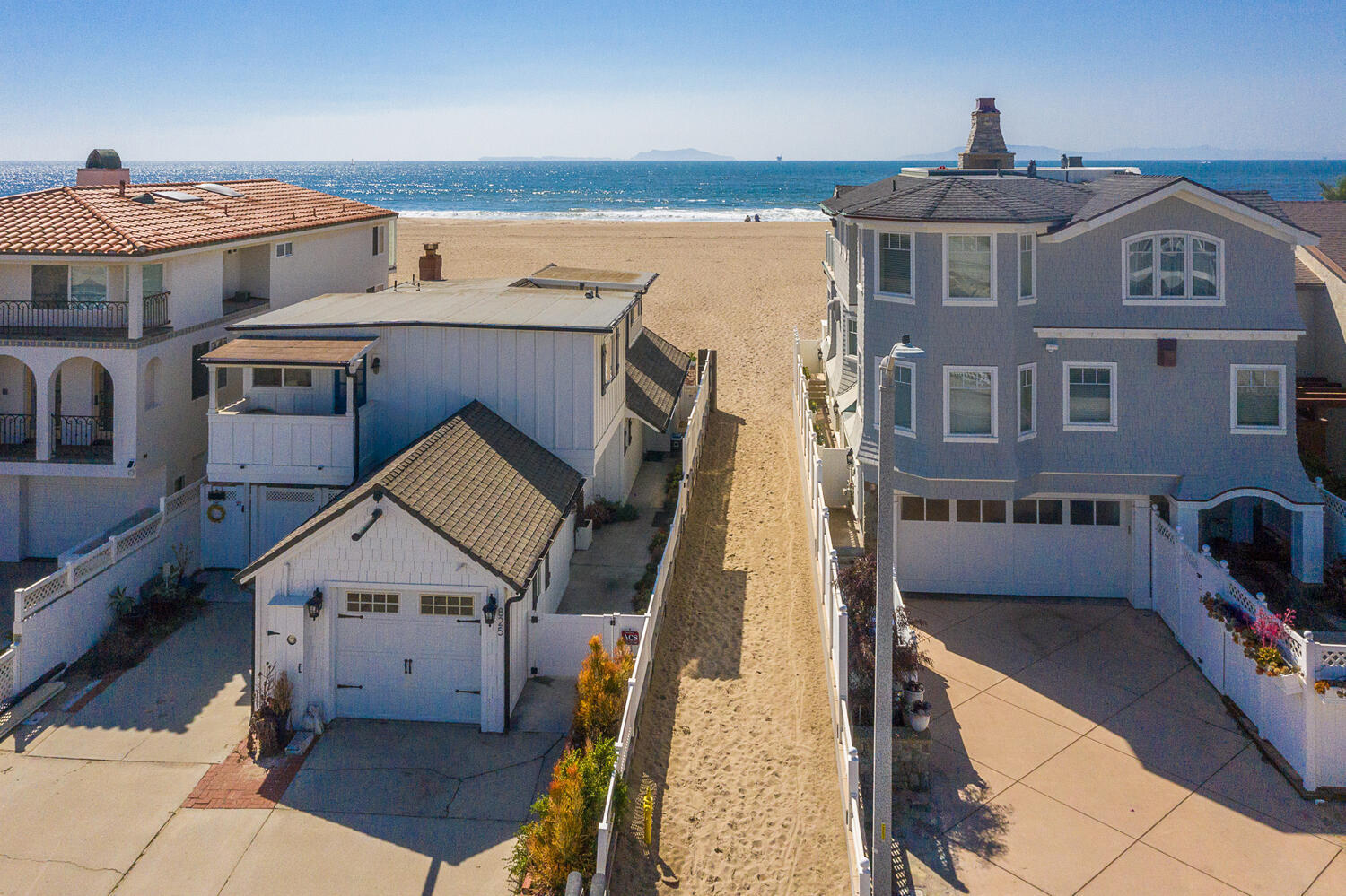 133 Burbank Avenue Oxnard, CA 93035 - Photo 3 of 40 a view of a big house with a big yard and large tree