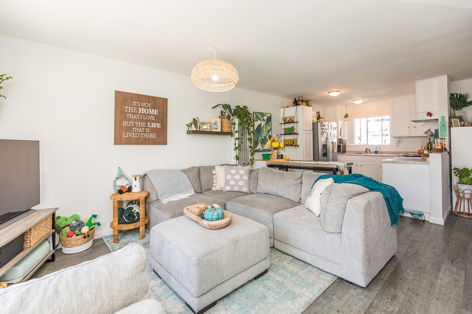133 Burbank Avenue Oxnard, CA 93035 - Photo 5 of 40 a living room with furniture and a flat screen tv
