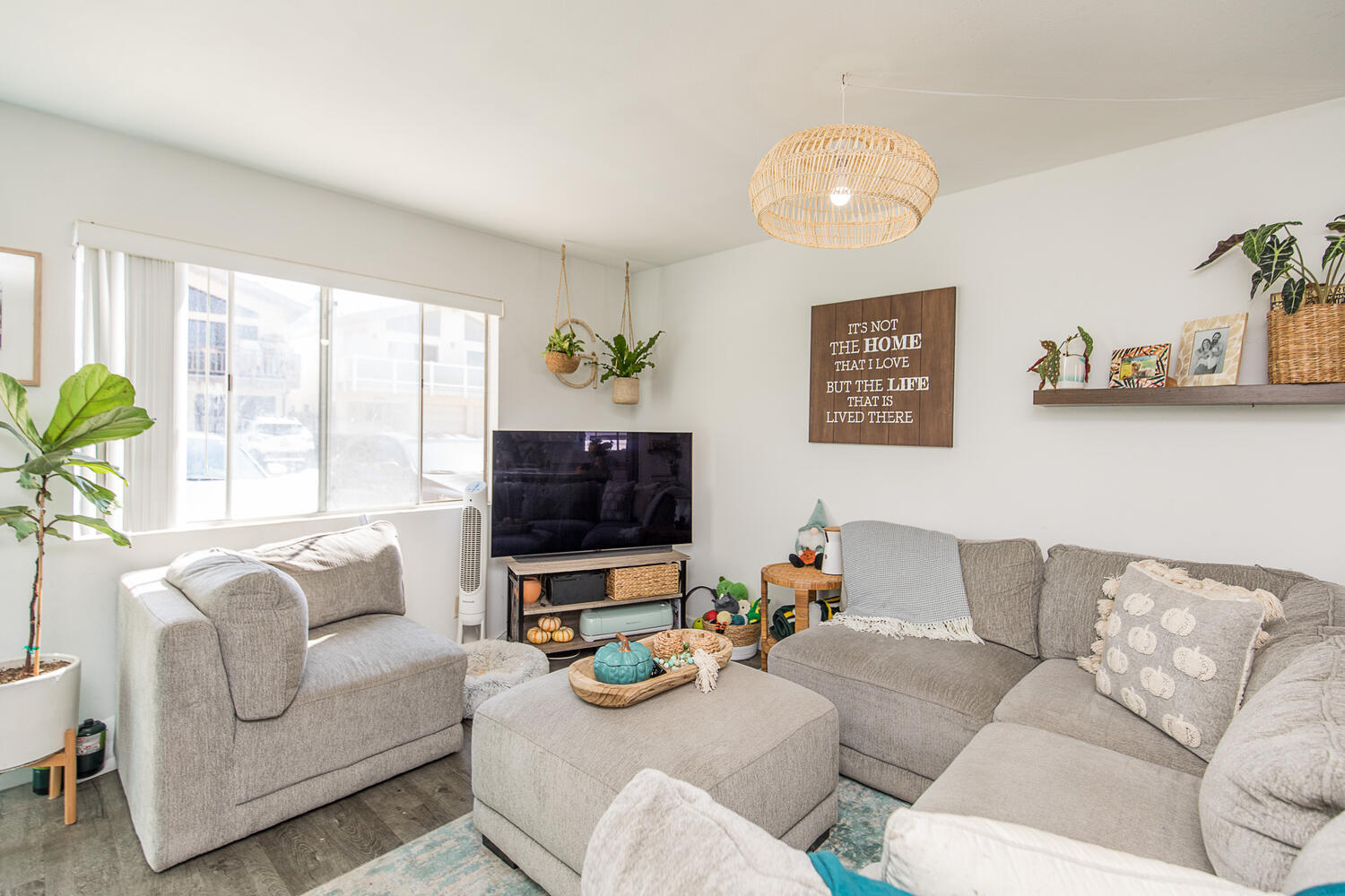 133 Burbank Avenue Oxnard, CA 93035 - Photo 9 of 40 a living room with furniture and a flat screen tv