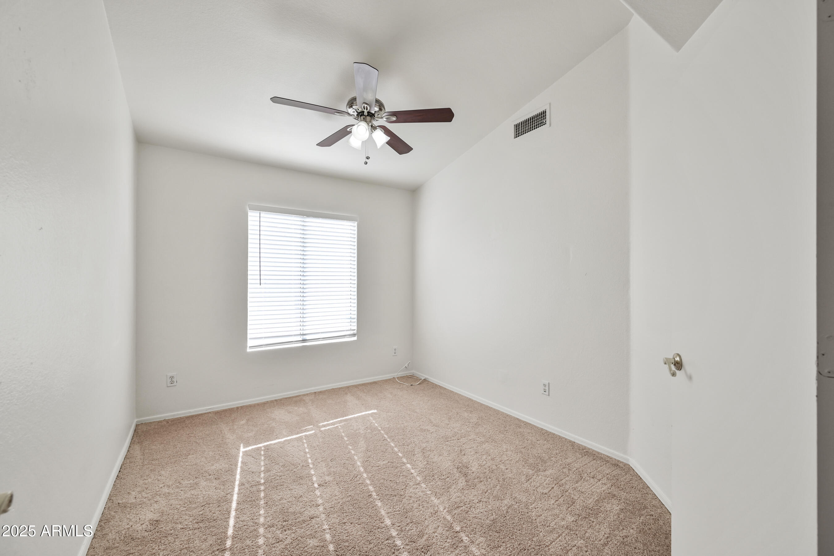 641 East Gail Drive Chandler, AZ 85225 - Photo 14 of 22 a view of an empty room with a window