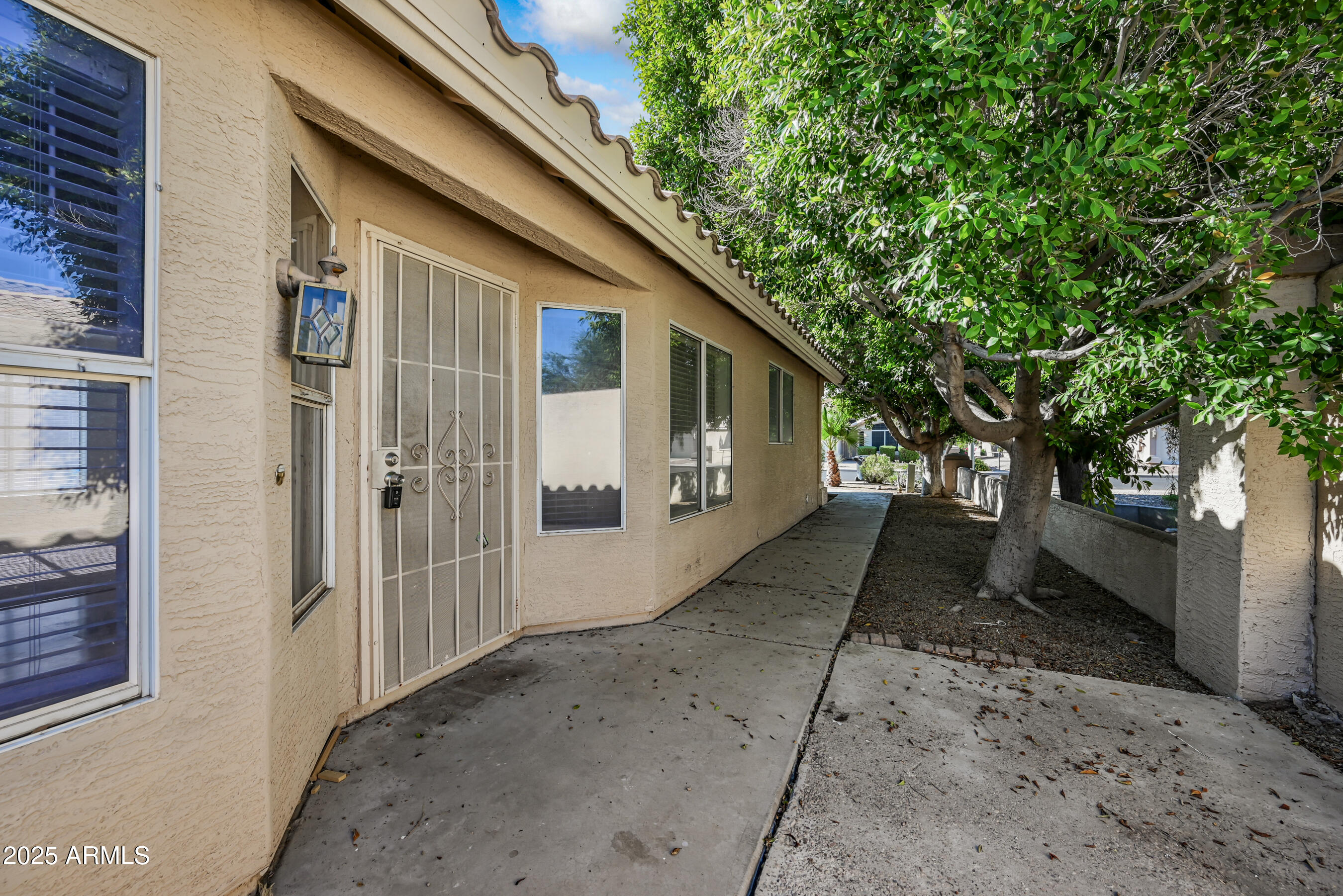 641 East Gail Drive Chandler, AZ 85225 - Photo 2 of 22 a view of a house with a yard