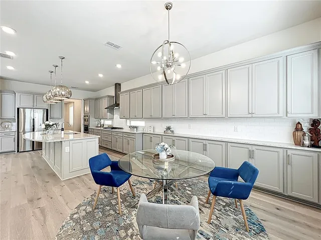 a living room with furniture and a rug