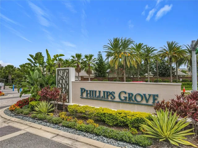 an outdoor living room with furniture and a window