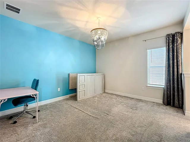 a aerial view of a house with a garden