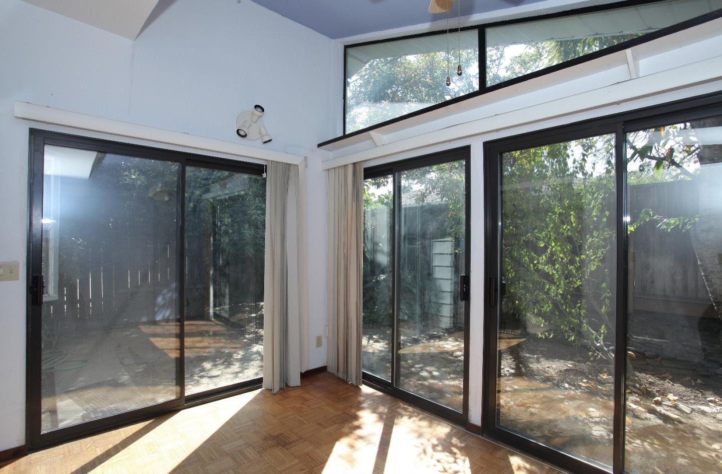 19100 Meiggs Lane Cupertino, CA 95014 - Photo 13 of 21 a view of a room with window and a balcony