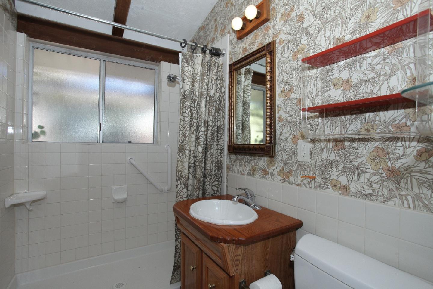 19100 Meiggs Lane Cupertino, CA 95014 - Photo 17 of 21 a bathroom with a sink toilet and shower