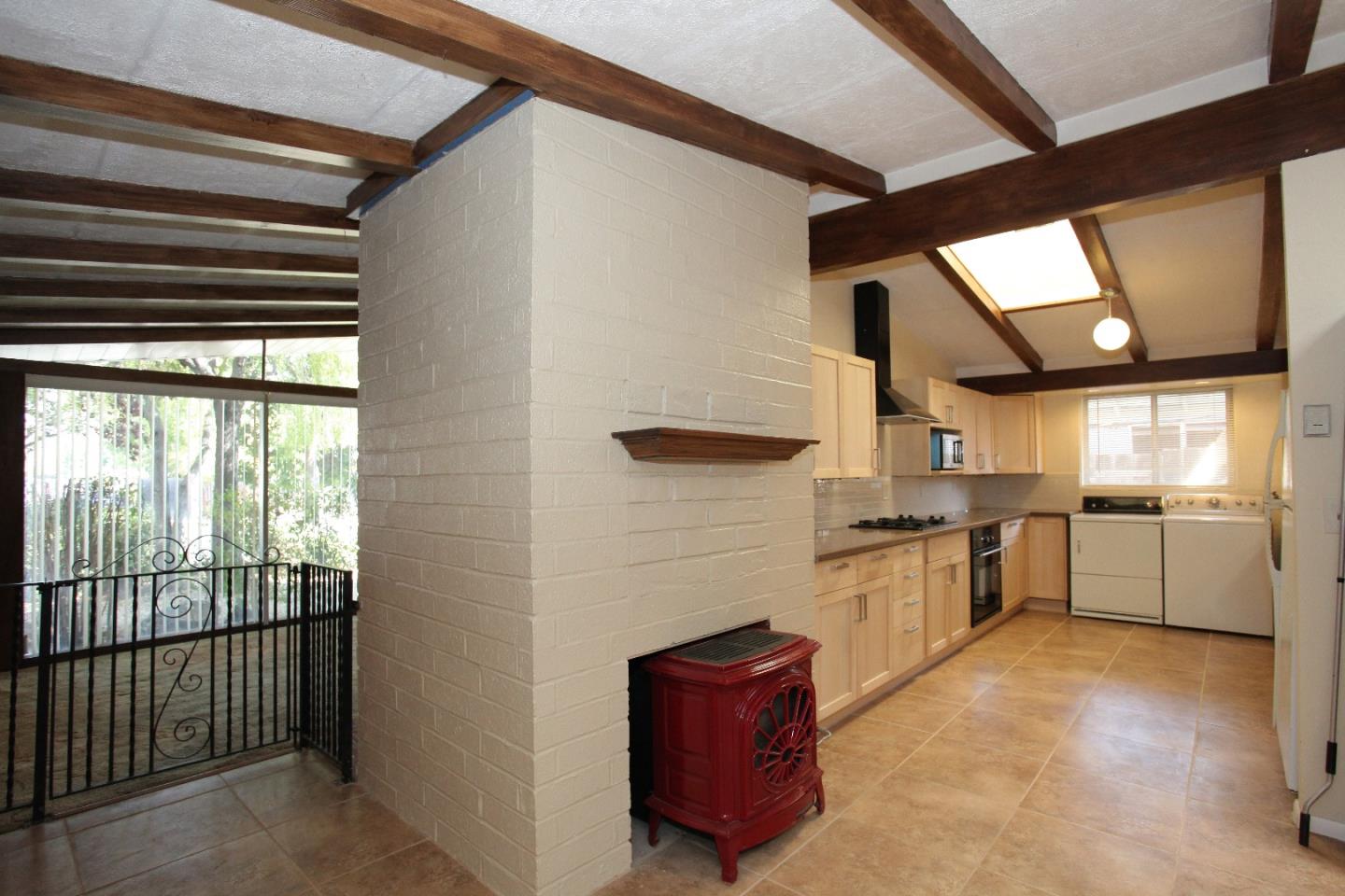 19100 Meiggs Lane Cupertino, CA 95014 - Photo 10 of 21 a kitchen that has a lot of cabinets in it