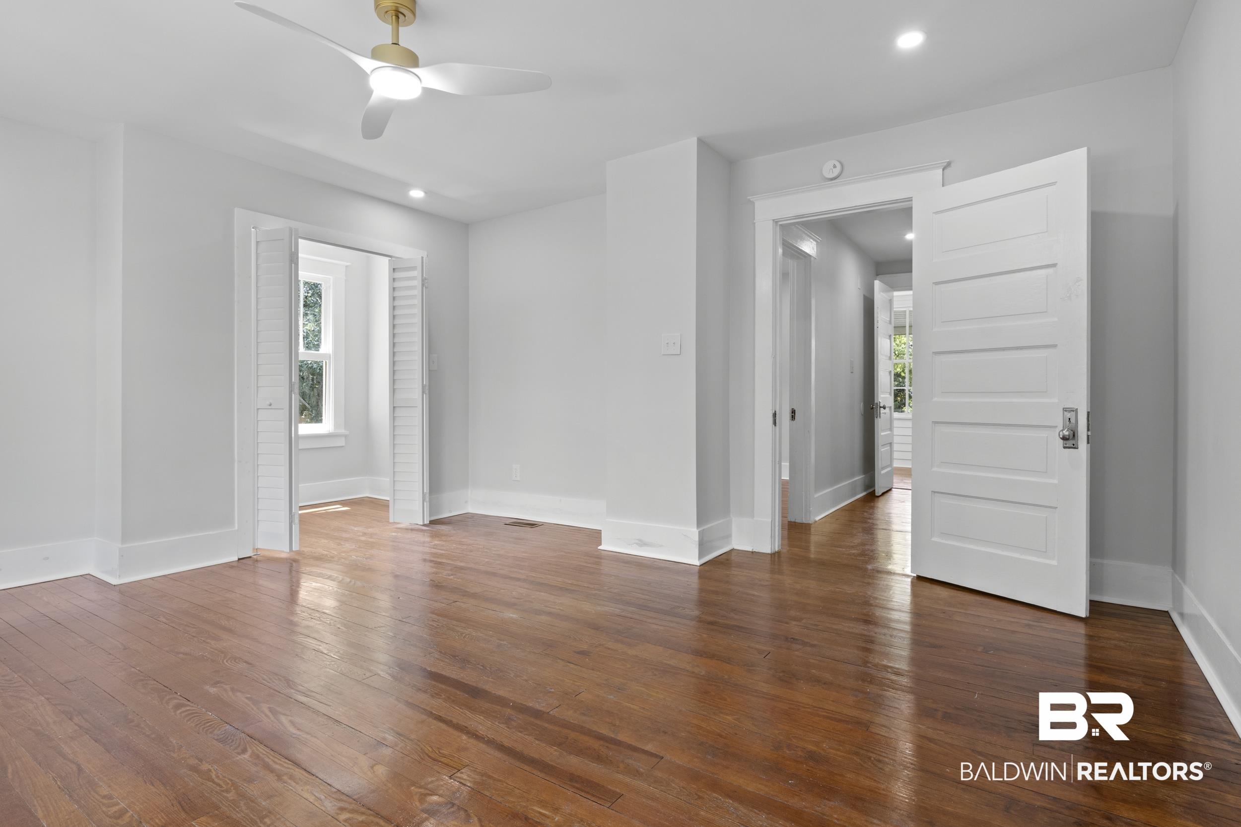 315 Park Avenue Mobile, AL 36607 - Photo 19 of 27 Unfurnished room featuring ceiling fan and hardwood / wood-style flooring