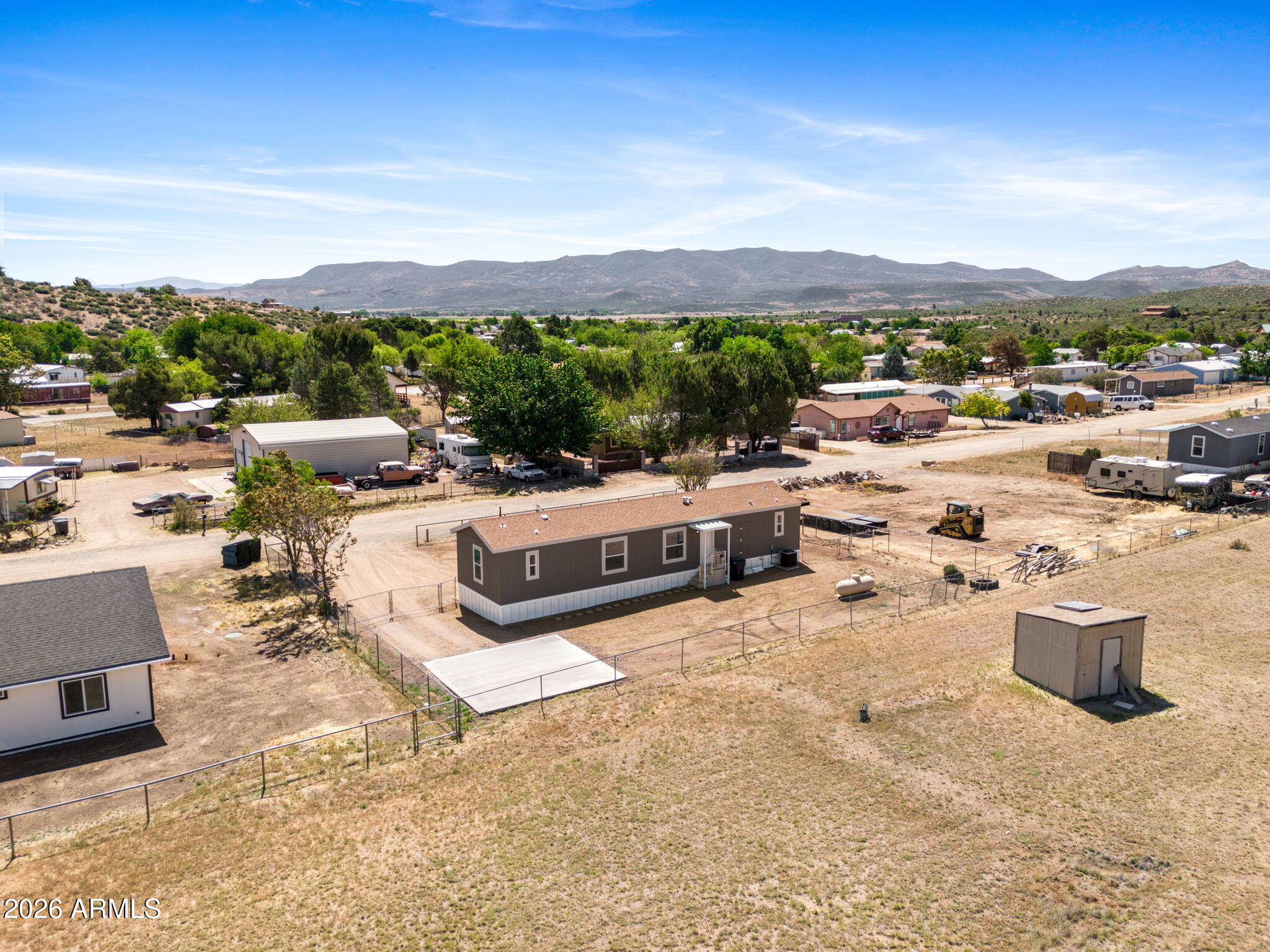 18296 Frontier Road Peeples Valley, AZ 86332 - Photo 35 of 44 a view of a terrace with lawn chairs