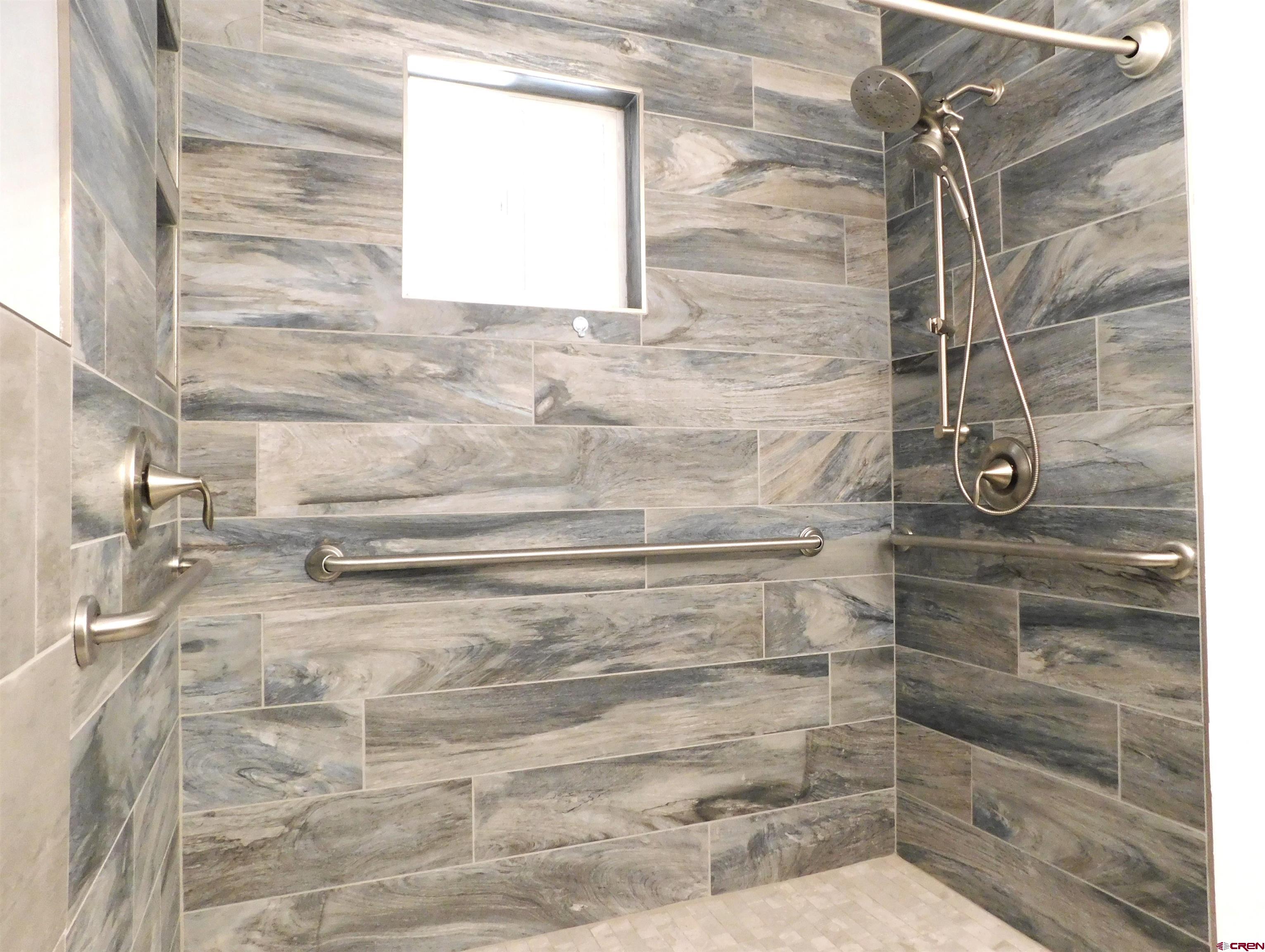 62855 Spring Creek Road Montrose, CO 81403 - Photo 20 of 34 Large New Custom Shower with dual heads in En Suite Bathroom