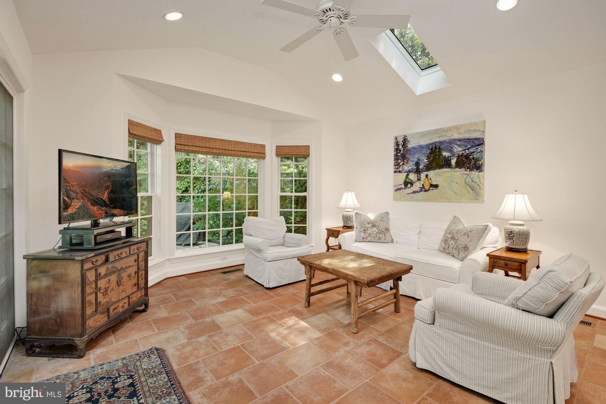 8213 Kerry Road Chevy Chase, MD 20815 - Photo 15 of 44 Family Room with bay window and doors to terrace