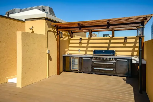 a front view of a house with a large window