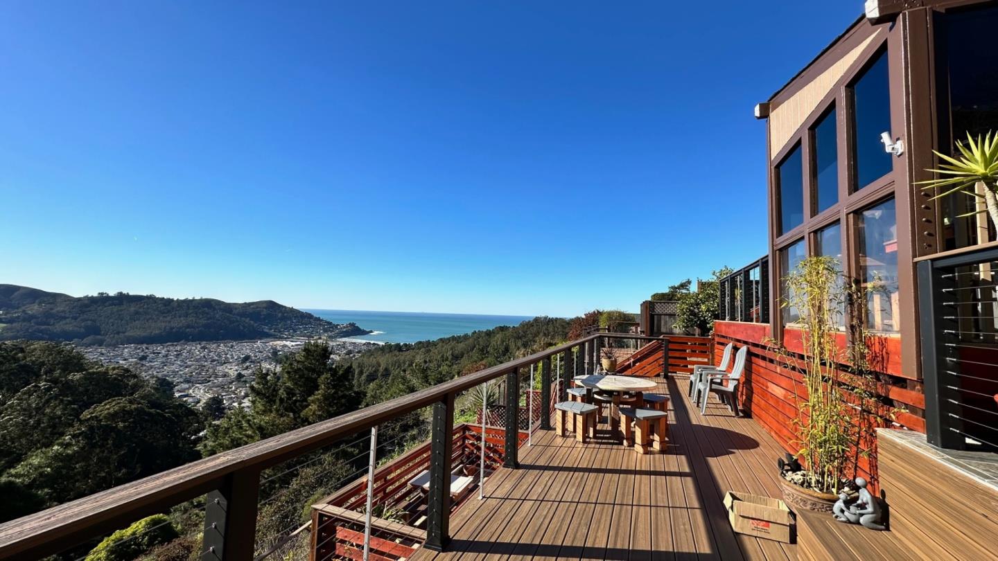 1419 Crespi Drive Pacifica, CA 94044 - Photo 1 of 1 a view of a balcony with an outdoor seating