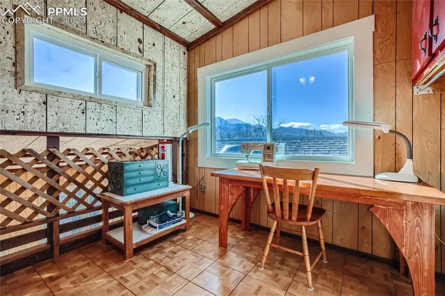 a outdoor space with a couch and chairs