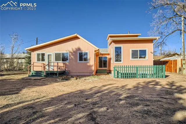 a backyard of a house with a small yard