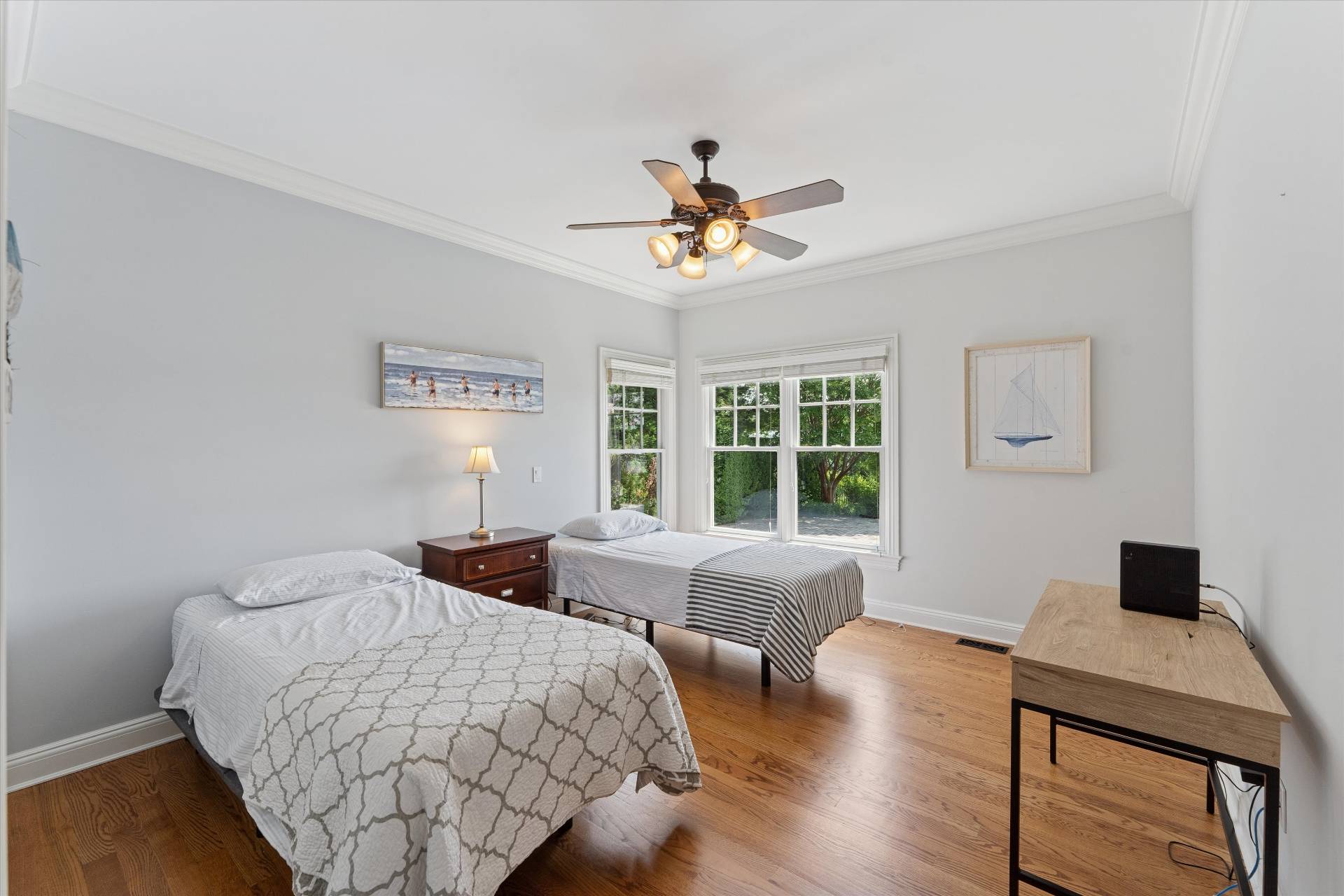 40 Overlook Drive Aquebogue, NY 11901 - Photo 18 of 32 a bedroom with a bed and wooden floor