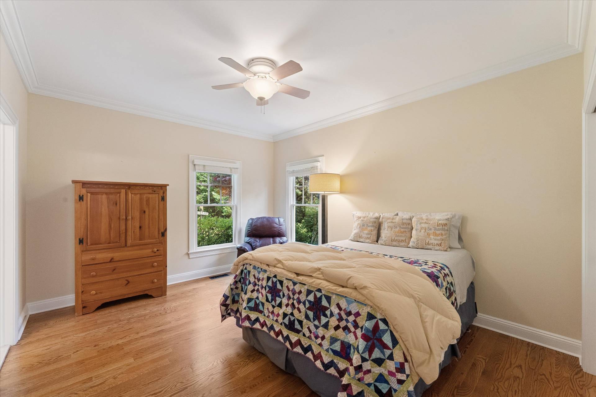 40 Overlook Drive Aquebogue, NY 11901 - Photo 19 of 32 a bedroom with a bed and wooden floor