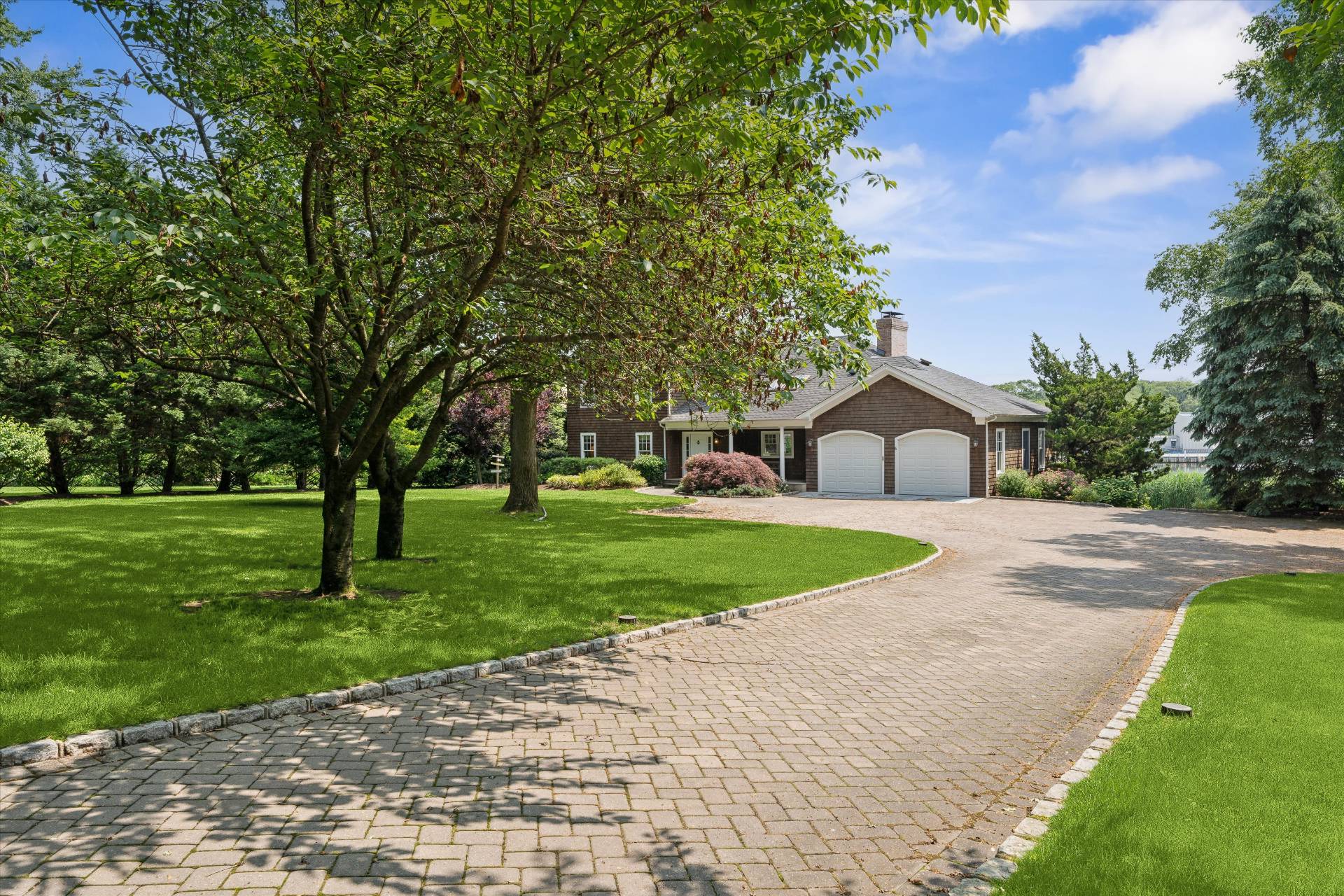 40 Overlook Drive Aquebogue, NY 11901 - Photo 28 of 32 a front view of a house with garden