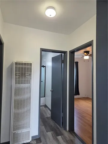 a kitchen with a refrigerator and a sink