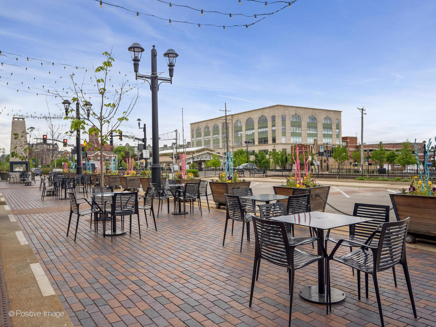 114 West Prairie Avenue Wheaton, IL 60187 - Photo 11 of 13 a view of a patio with dining table and chairs