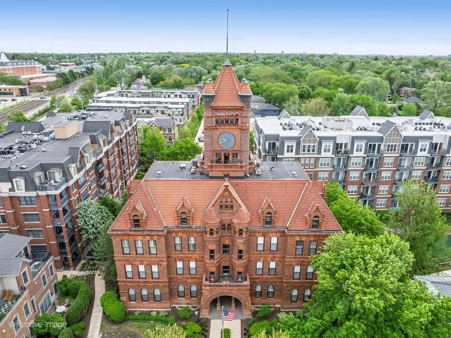 114 West Prairie Avenue Wheaton, IL 60187 - Photo 9 of 13 a aerial view of a multi story building