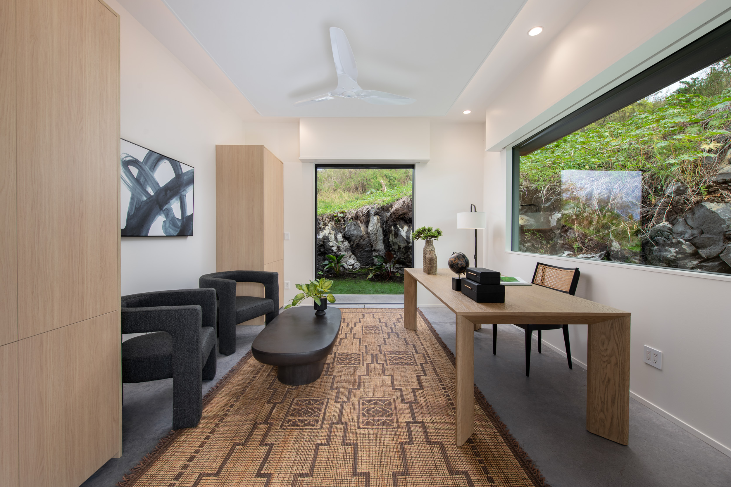 82-5879 Government Main Road Captain Cook, HI 96704 - Photo 18 of 30 a living room with furniture and a large window