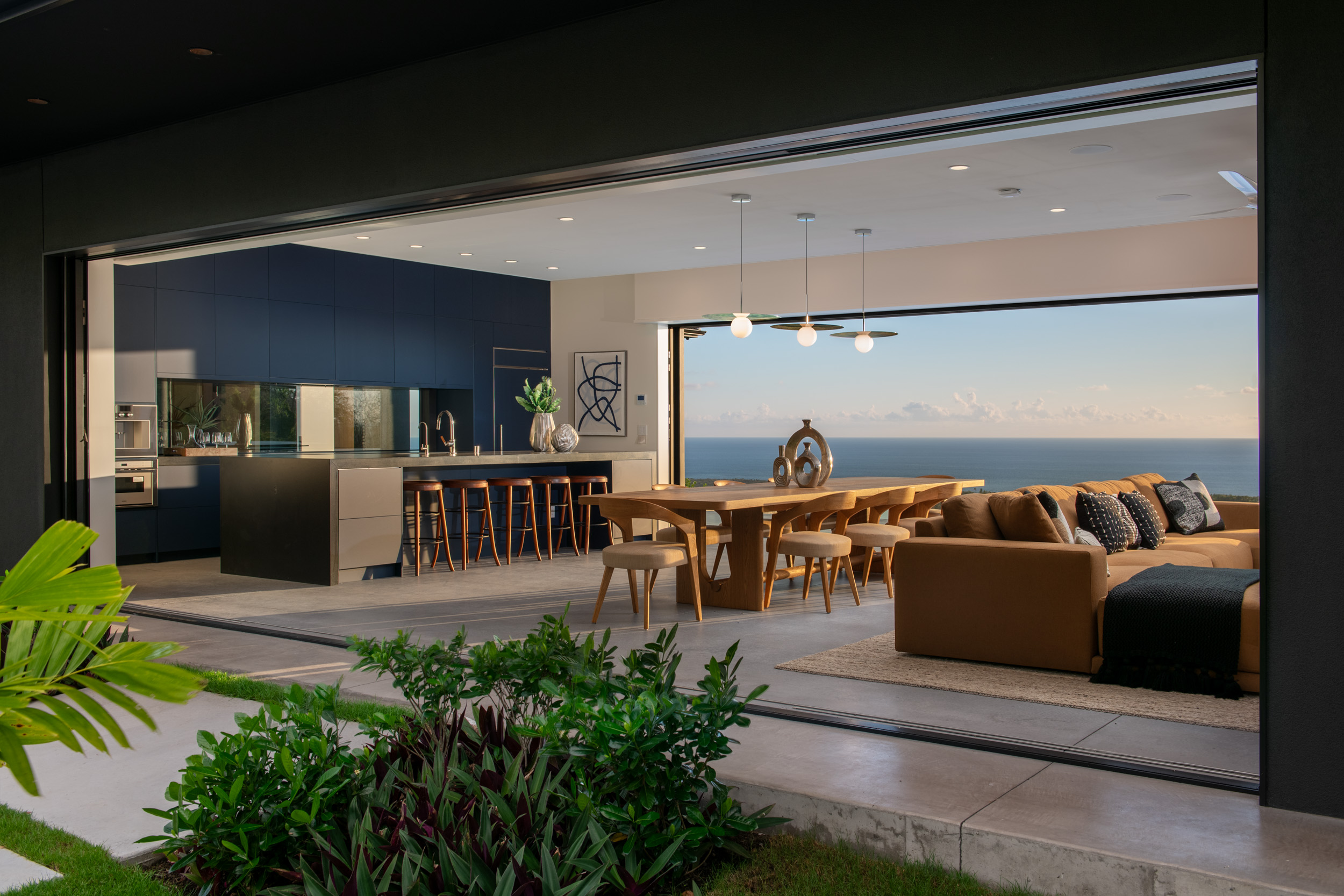 82-5879 Government Main Road Captain Cook, HI 96704 - Photo 19 of 30 a living room with furniture potted plant and a table