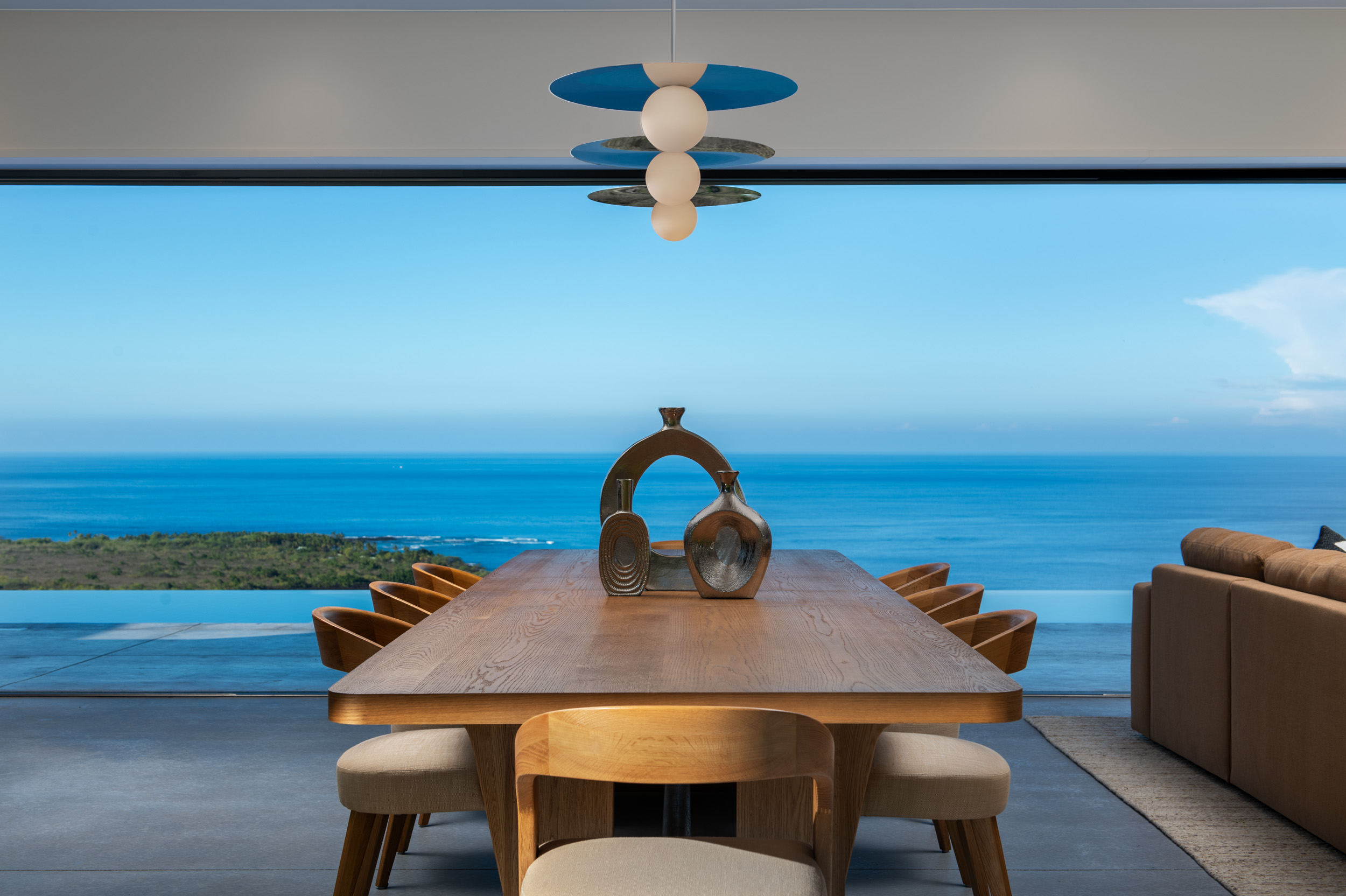 82-5879 Government Main Road Captain Cook, HI 96704 - Photo 2 of 30 a view of a dining room with furniture and wooden floor