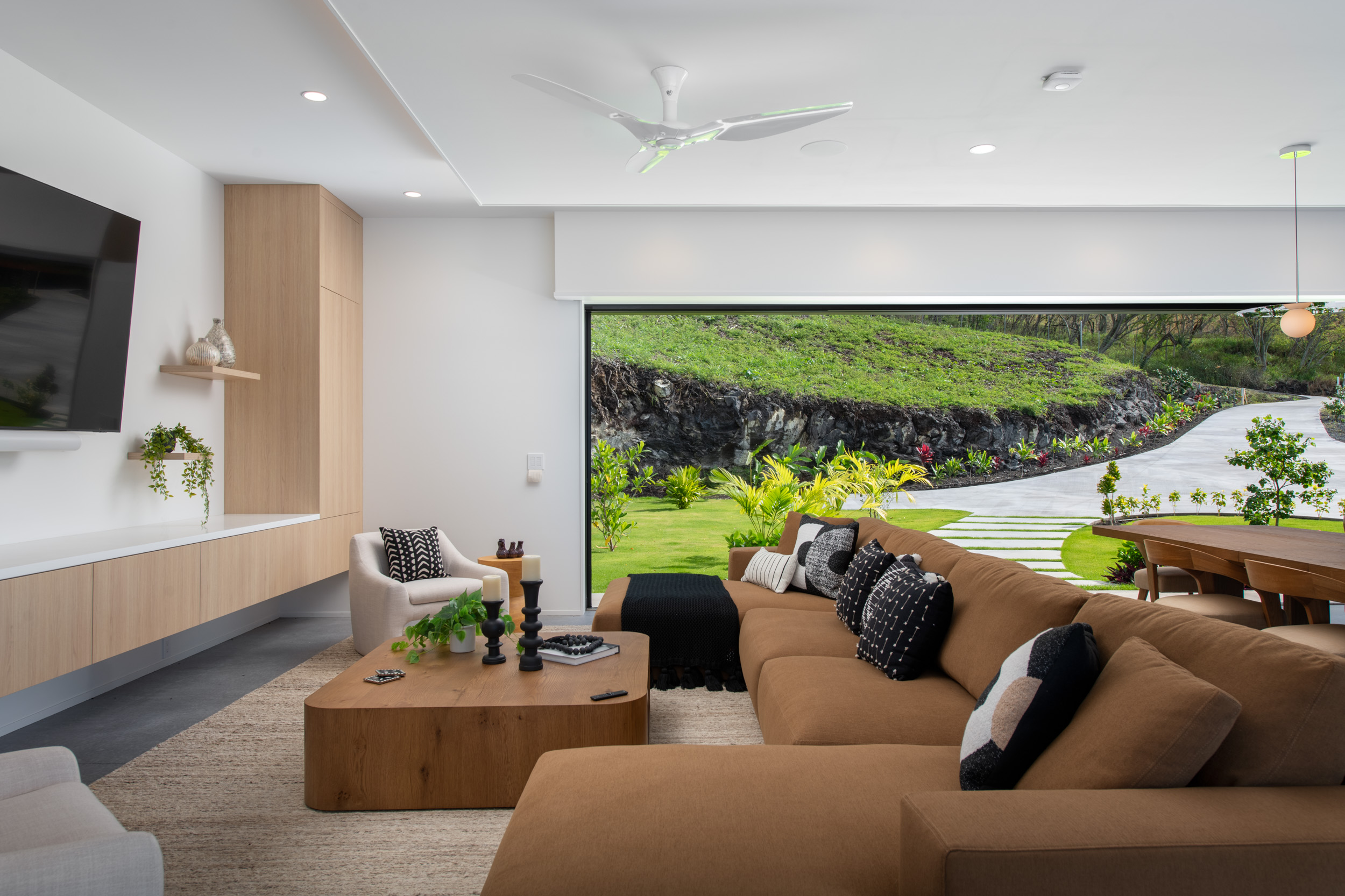 82-5879 Government Main Road Captain Cook, HI 96704 - Photo 6 of 30 a living room with furniture and a flat screen tv